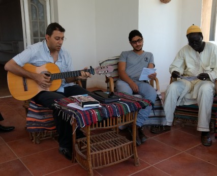 Michel Ezzat who graduated in Theology, playing guitar at the St Andrew's retreat